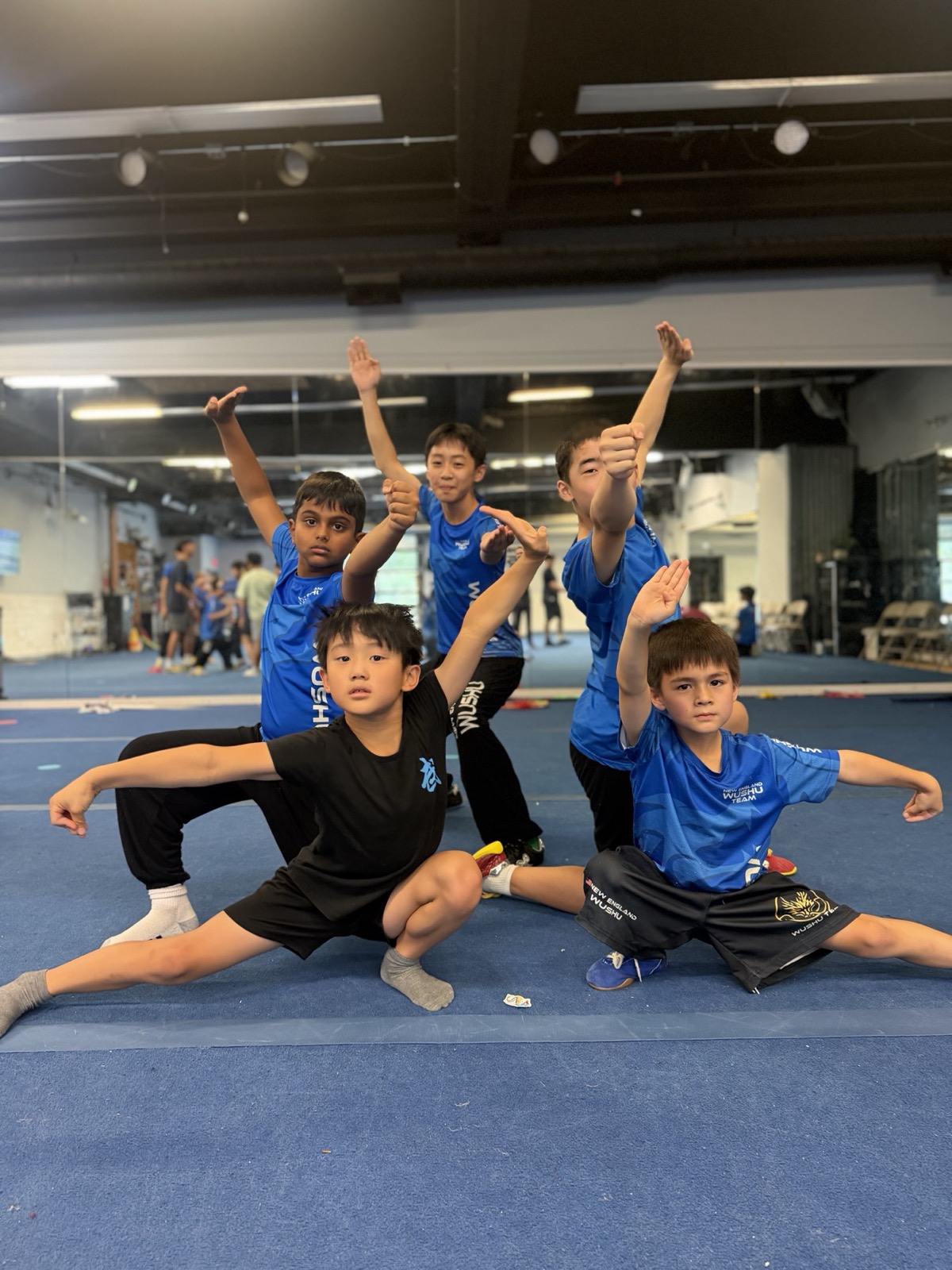 Kids strike a pose together after class